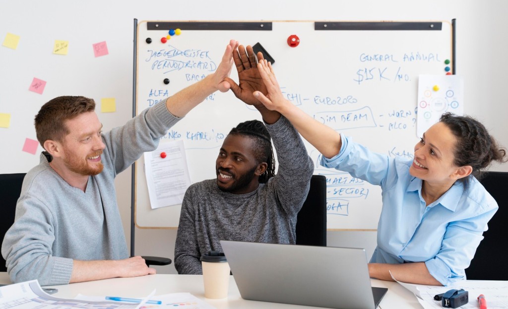 Team collaborating over data charts and results