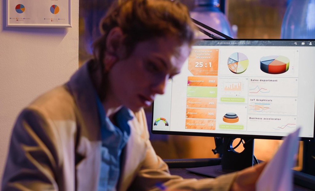 Person comparing two document options on screen